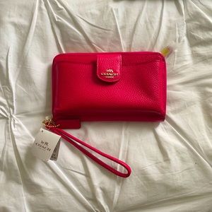 Pink genuine coach wristlet